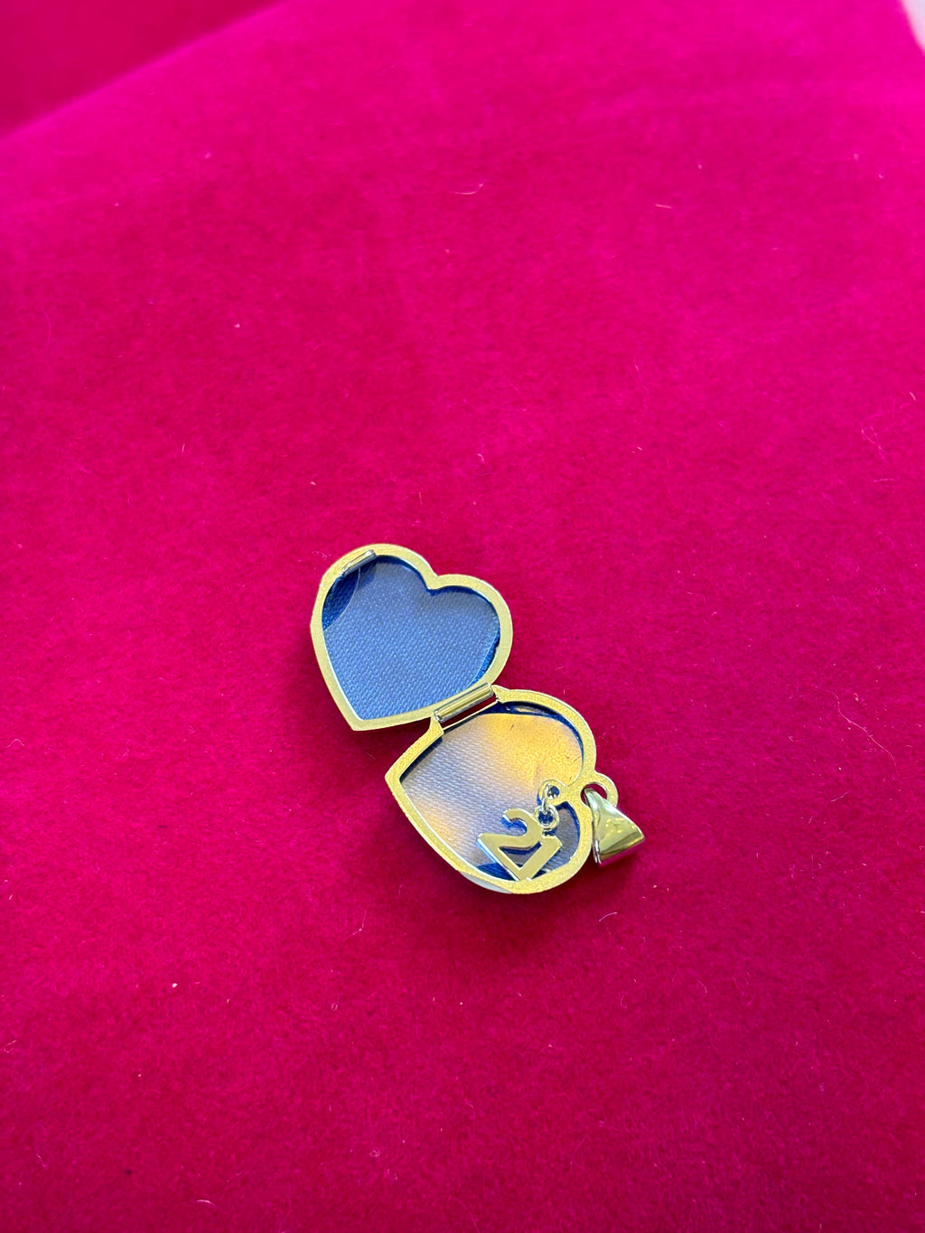 Sterling Silver Rhodium-plated Diamond 21 Dangle 15mm Heart Locket