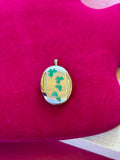 Sterling Silver Rhodium-plated Satin Enameled Clovers Oval Locket