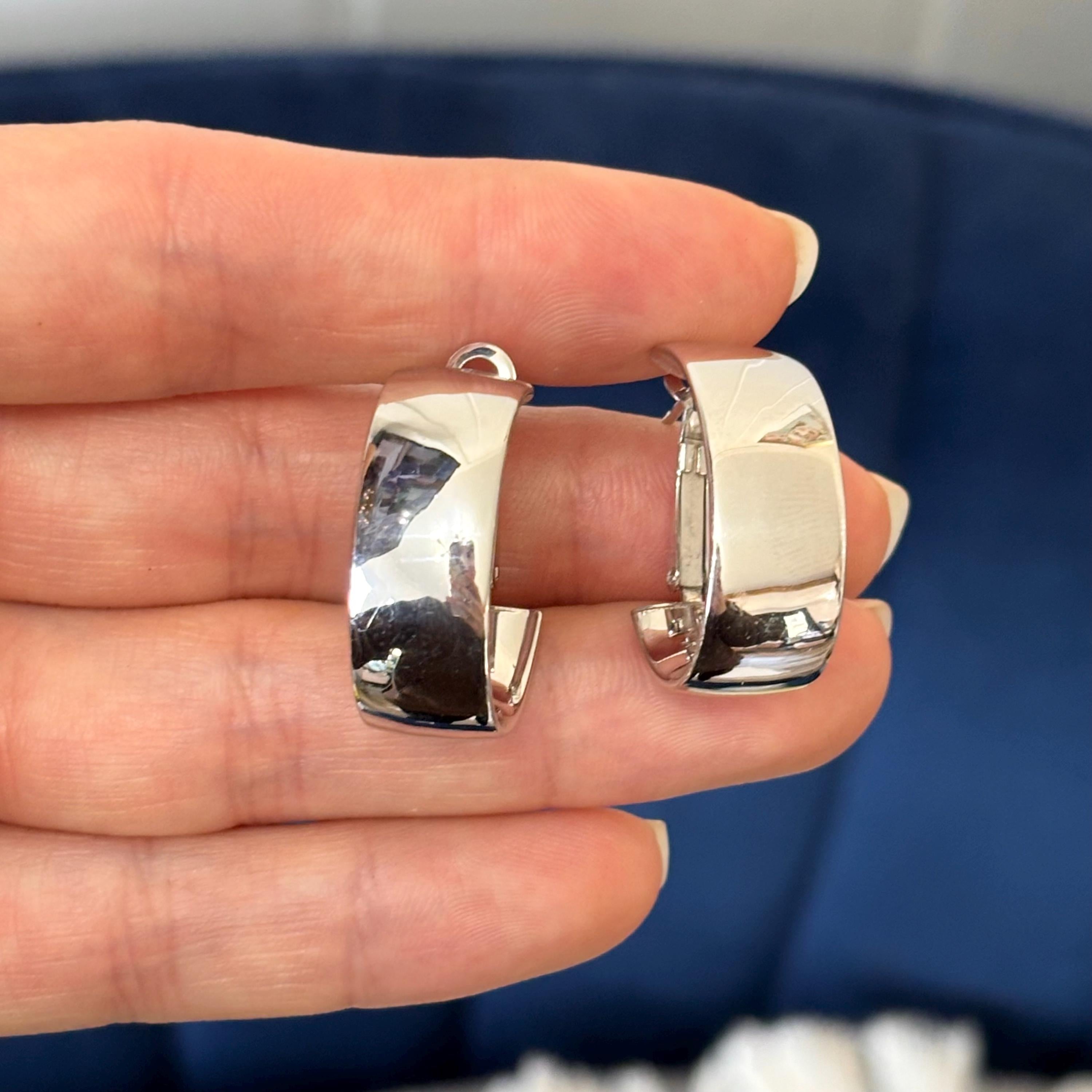 Sterling Silver Rhodium-plated Polished 10mm Omega-back Oval Hoop Earrings