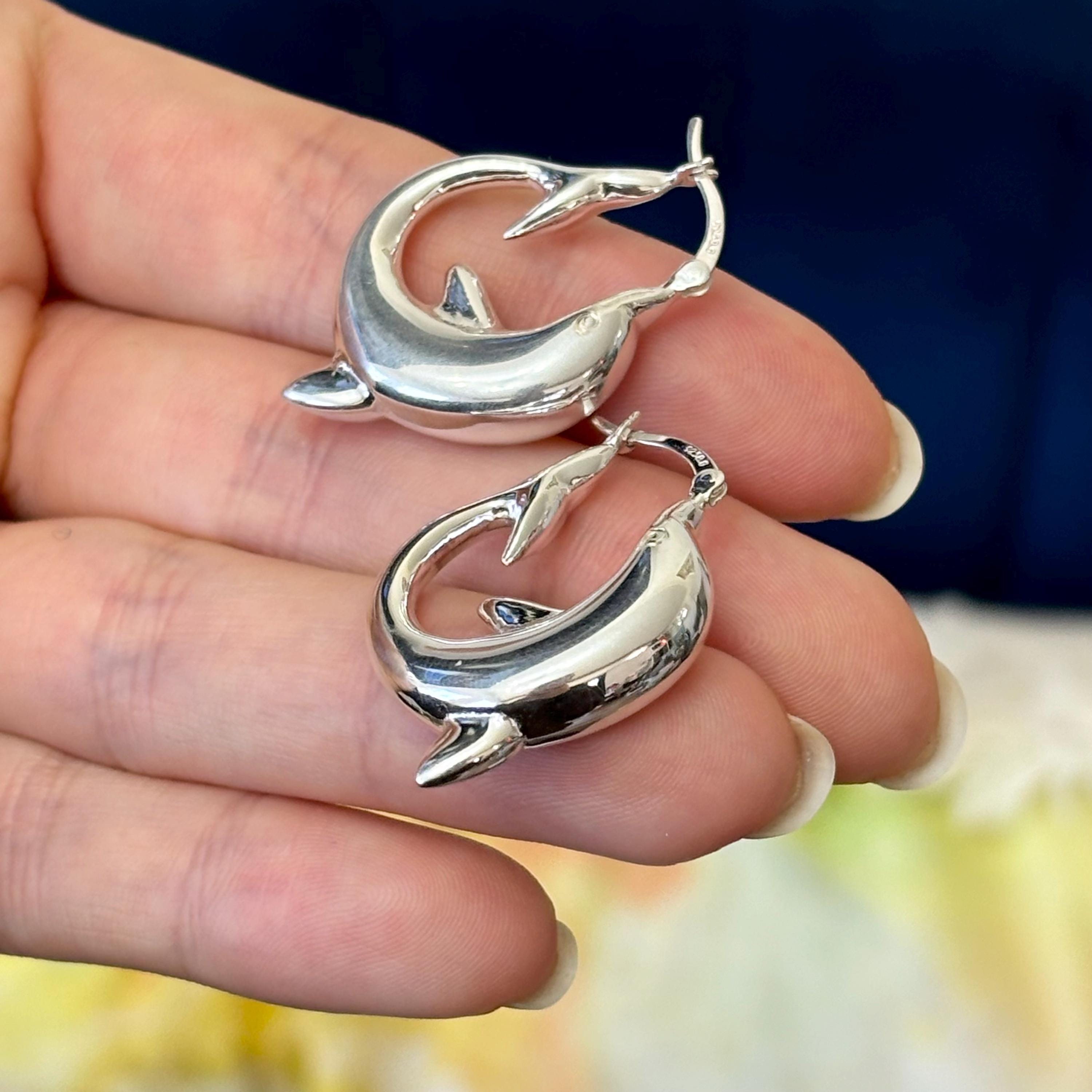 Sterling Silver Polished Playful Dolphin Round Hoop Earrings