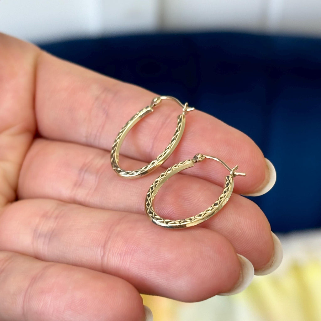 10k Gold textured Diamond-cut Oval Hoop Earrings