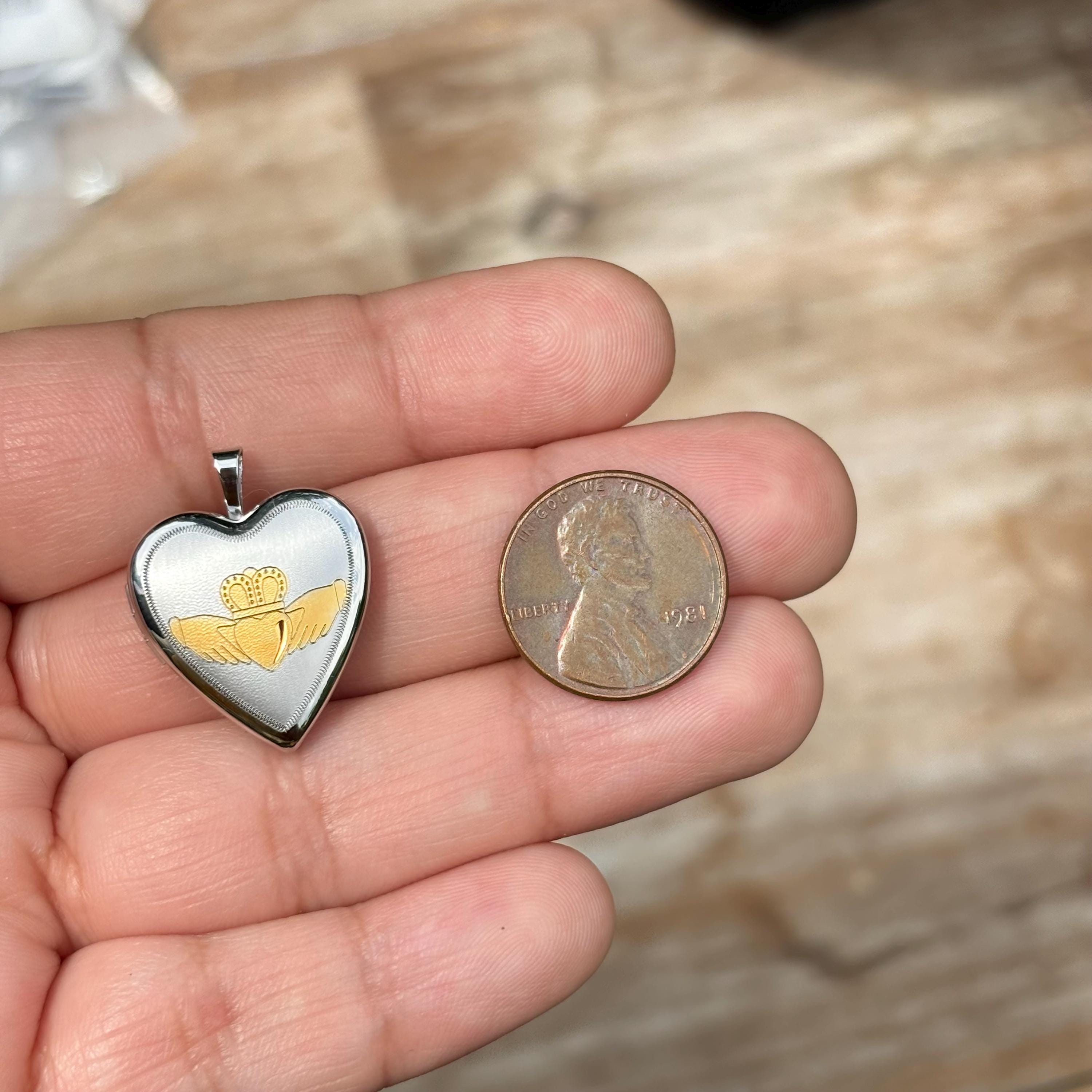 Sterling Silver and Gold-tone Satin and Polished Claddagh Heart Locket